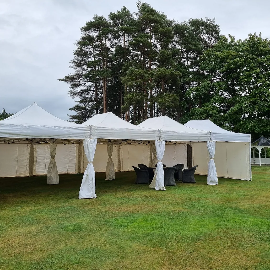 Large white marquee with seating